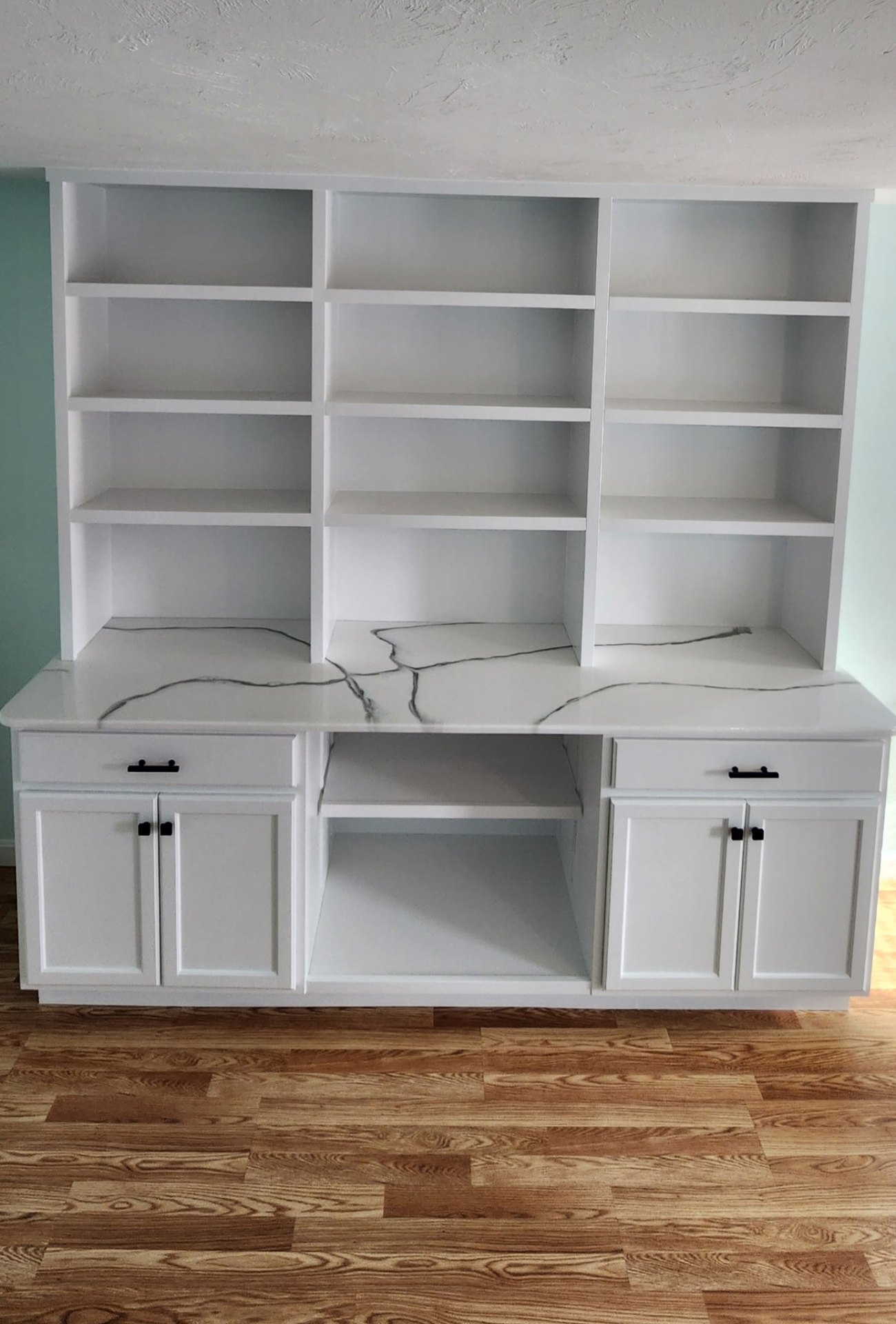 Custom built-in hutch with shaker cabinets, open shelving, and marbled stone counter, South Shore MA